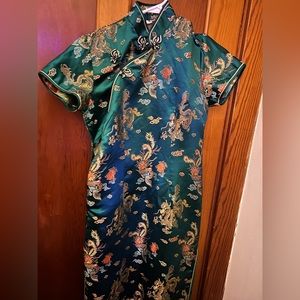 A green, gold, and red kimono dress